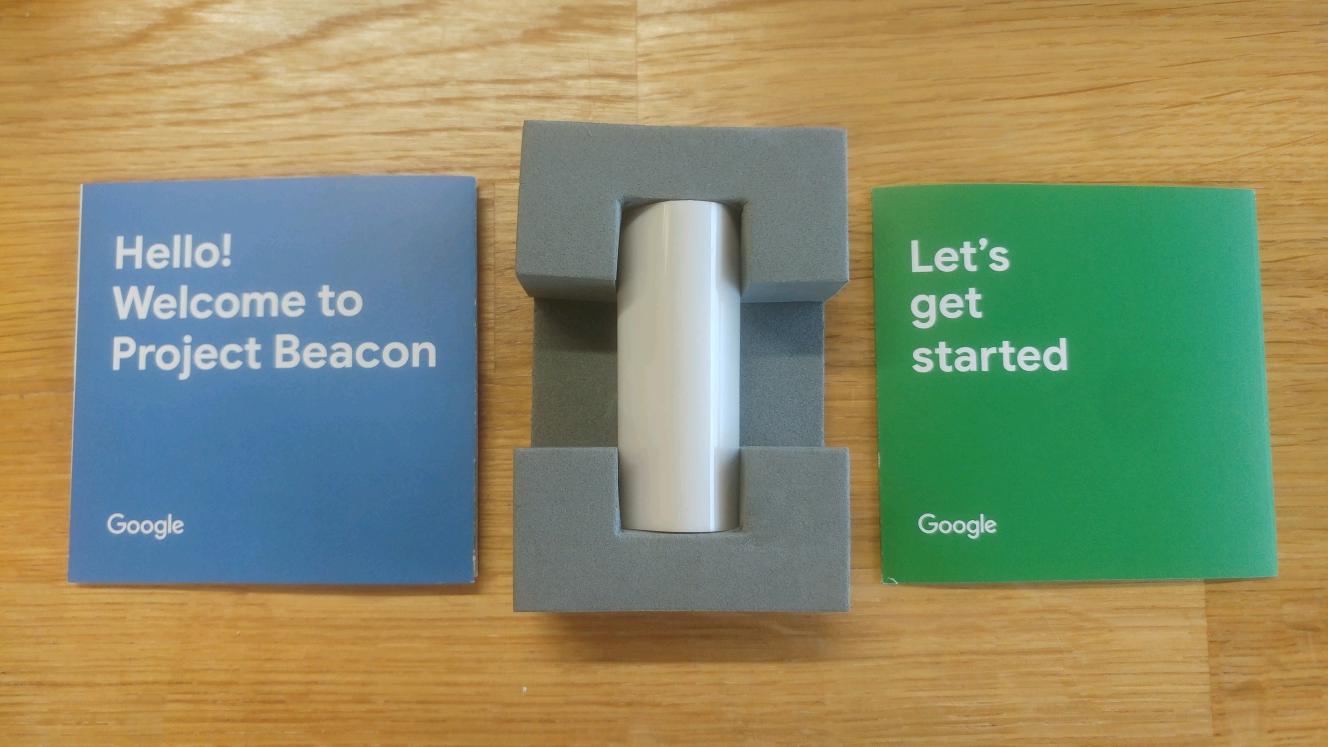 Google Beacon with leaflets on wood